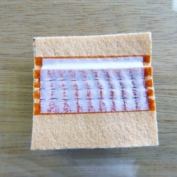 A szűrőzsák szivárgásmegelőzésének lehetőségei a széntüzelésű erőművekben: A ragasztó bevonási folyamat és a PTFE szalag alkalmazási folyamatának összehasonlítása